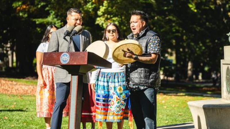 Jason Hale, senior research scientist in the College of Health and IIS, performs with his family 