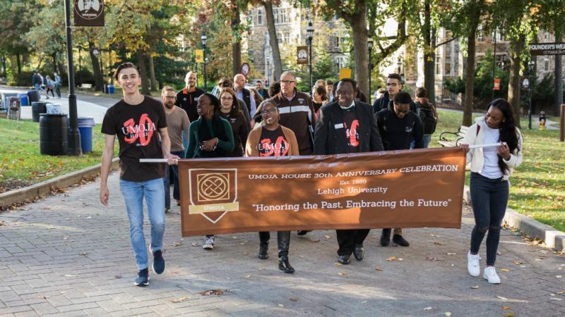 Faculty, staff and students participate in the Umoja House Honor Walk
